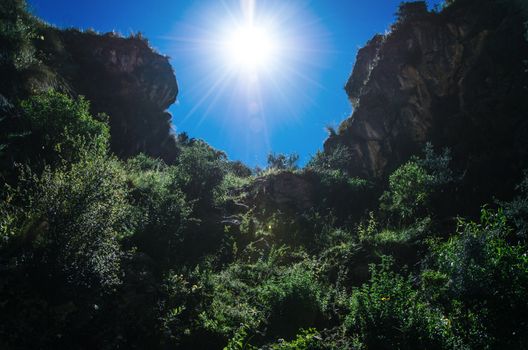 The sun shining through the rocks in Ayacucho - Peru