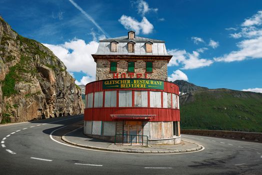 Furka Pass, Switzerland - July 21, 2019 : An old and closed mountain hotel Belvedere located near the Rhone Glacier at the Furka Pass.