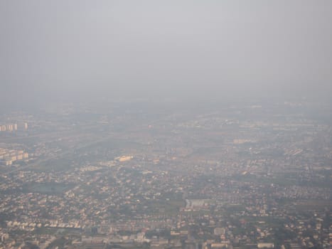 Bangkok / Thailand - 24 January 2020: high view from airplane of dusty view, PM 2.5 in the air, pollution in Bangkok city, Thailand.