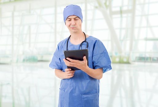 male doctor with tablet pc at the hospital