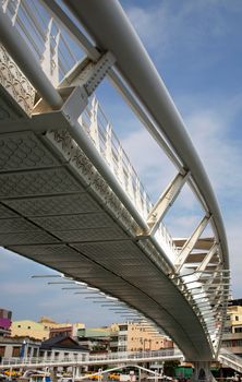 A curved bridge in contemporary design for pedestrians 
