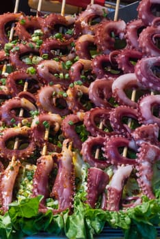 Fresh squid on skewers on a chinese market in Chengdu, Sichuan province, China