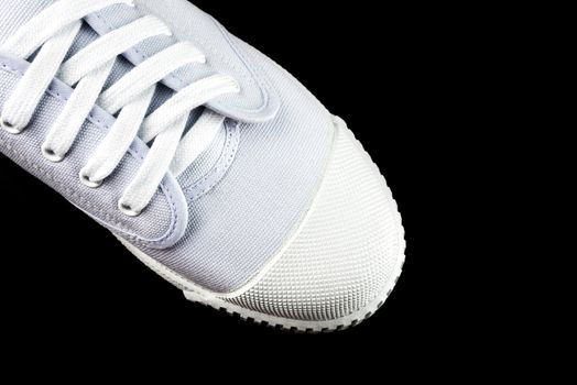 Top View White Sneakers isolated on black background