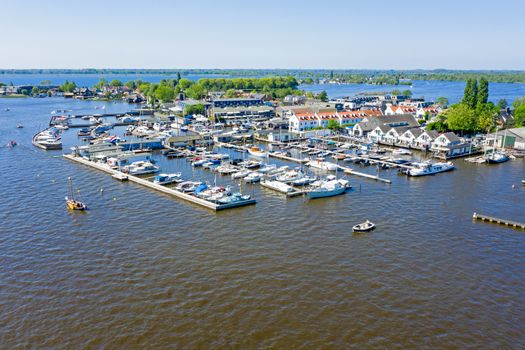 Aerial from the harbor at the Loosdrechtse Plassen in the Netherlands on a beautiful summer day