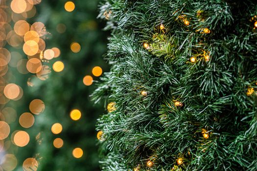 Christmas lights and decorations on the facade of the building, Selective focus, defocused Christmas background 