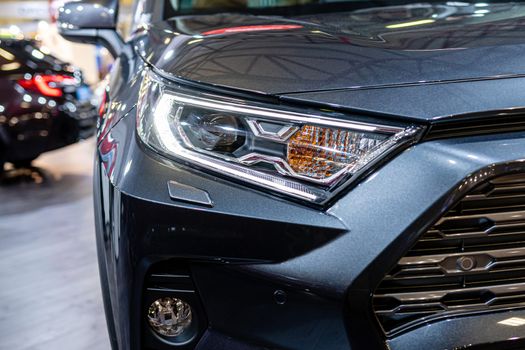 Close-up of the front light of a modern car. Exterior details - image