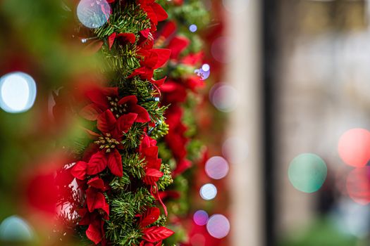 Christmas lights and decorations on the facade of the building, Selective focus, defocused Christmas background 