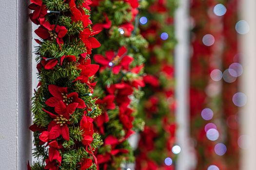 Christmas lights and decorations on the facade of the building, Selective focus, defocused Christmas background 