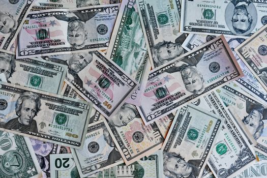 business, finance, investment, saving and corruption concept - money background from dollars usa