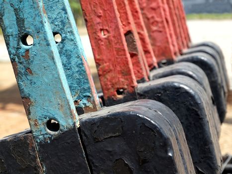 Old manual railroad switching device with colored levers




