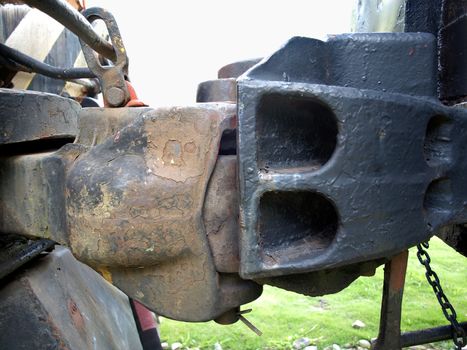 Vintage boxcar iron coupler with buffer and chain
