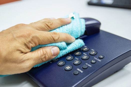Concept Prevention cleaning frequently, Focus on the high traffic areas that enable pathogens to spread around the telephone equipment such Phone button 