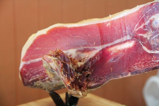 Jamon, traditional spanish ham close up. Hamon iberico, cut pork leg