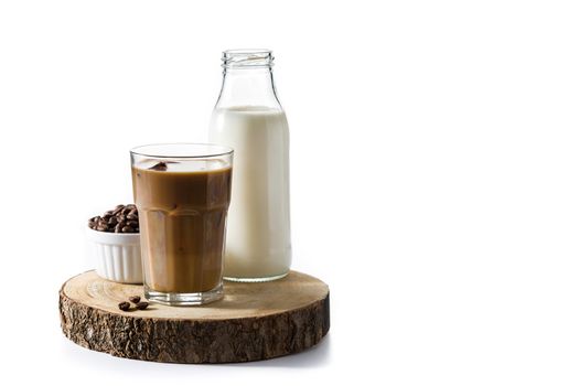 Iced coffee or caffe latte in tall glass on wooden table