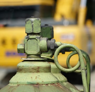 Acetylen and oxygen bottles used for welding at a construction site