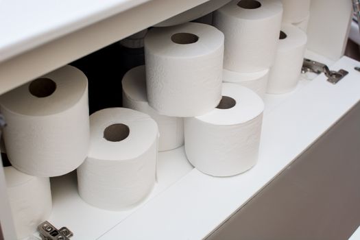 Paper rolls in bathroom furniture