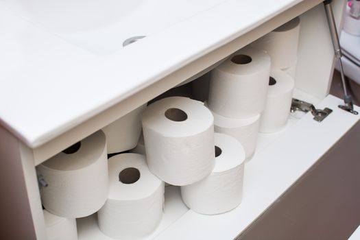 Paper rolls in bathroom furniture