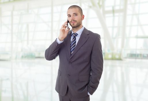 worried business man on the phone, at the office