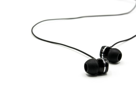Black earphones isolated on white background