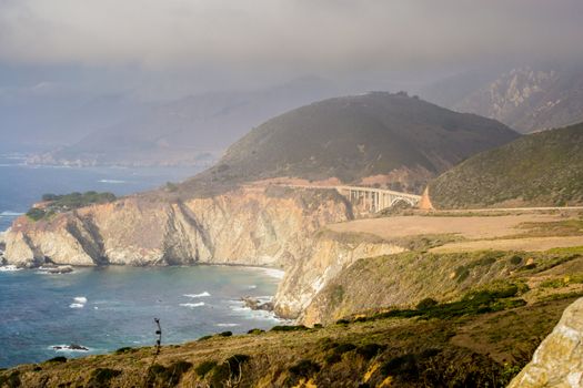 Coastal view of Big Sur landscape and scenery, with pacific ocean and rocks on the coastline during sunset.California, USA. Travel and tourism