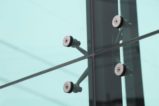 Point support glass for hold with structure. Tools for holding structures with glass doors.