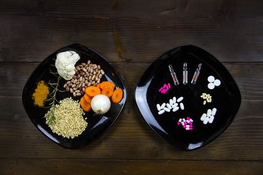 Prevention with healthy eating or treatment with medicines? The contrast between a plate full of vegetables and cereals and another with medicines