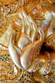 Close up Ancient Golden Hand Sculpture.