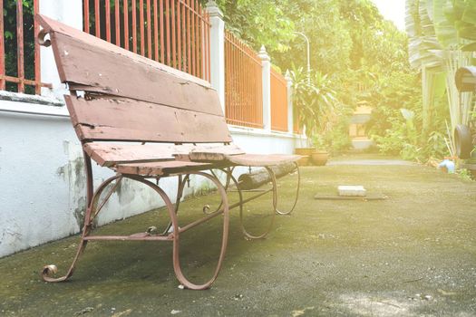 Blurred Bench in Park with Light Leak.