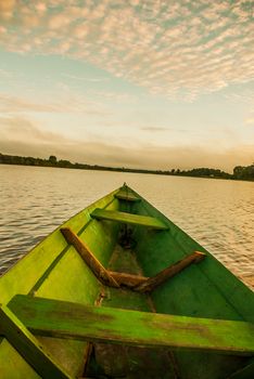 Beautiful sunrise on the river. View from the boat at Amazon river, with a dense forest on the shore and blue sky, Anazonas, Brazil. South America