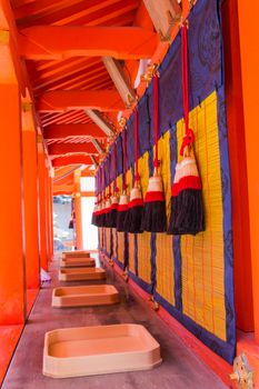 Japanese bell tie with fabric inside the Fushimi Inari Shrine is the famous Shinto shrine in Kyoto, Japan.