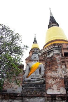 Pagoda and Buddha Statues at Wat Yai Chaimongkol famous and popular tourist destinations Ayutthaya, Thailand.