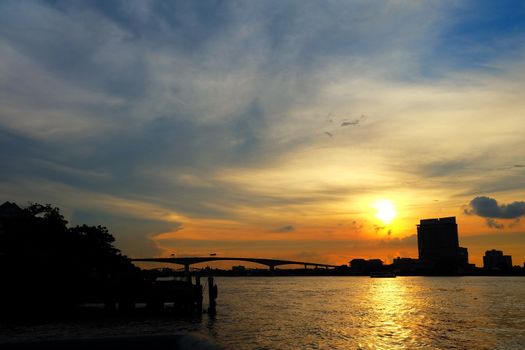 Scenery of Sunset at Chaophraya River at Asiatique Market Pier. Chaophraya River is the major river in Bangkok, Thailand.