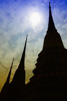 Silhouette of Ancient Pagodas at Wat Pho Temple.