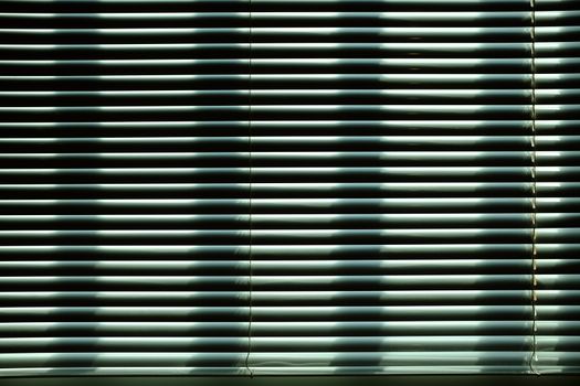 Window Blind with Soft Light Beam Background.