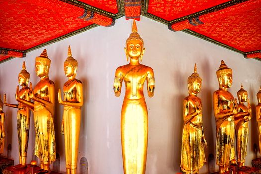 Ancient Golden Buddha Images at The Public Hallway of Wat Pho Temple.