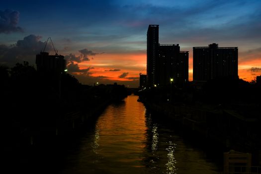 Sunset at Phra Sri Charoen Canal Bangkok, Thailand.