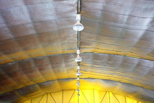 Hanging Lamps inside Big Tent with Heat Shield.