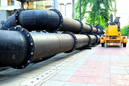 Giant Overflow Pipe with Water Pump Using for Flood Protection.