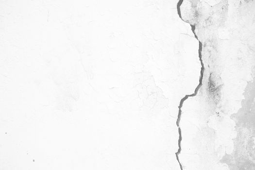 White Cracked Concrete Wall Background.