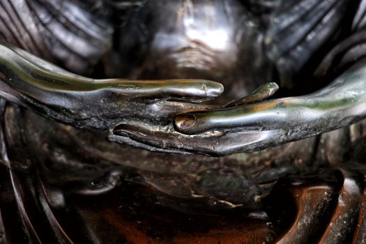 Close-up Meditation Hands of Buddha image.