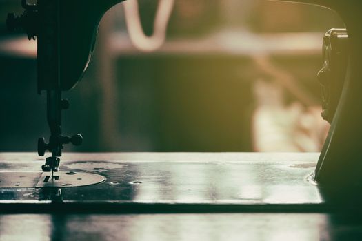 Ancient Sewing Machine with Light Leak.