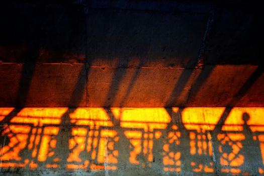 Silhouette of Man Walking on Overpass.