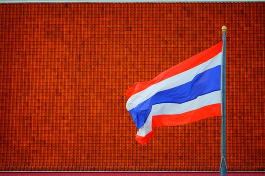 Thai Flag with Red Roof Background.