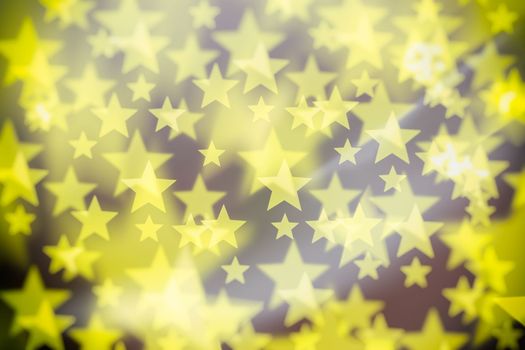 Abstract Yellow Bokeh Star Background.