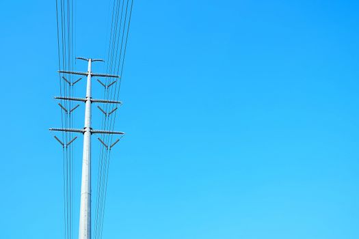 Big Electric Pole with Blue Sky with Space for Text.