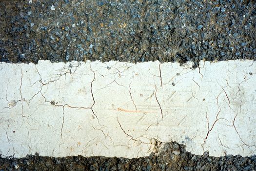 White Line on Asphalt Concrete Road.