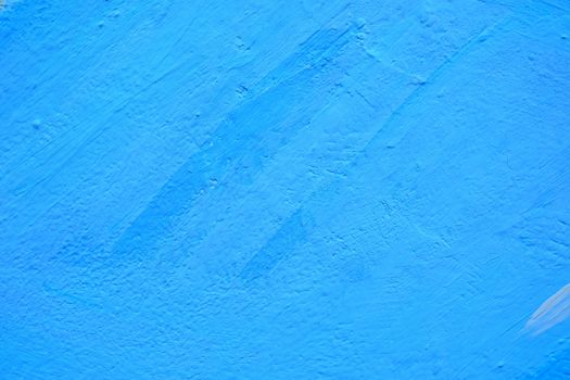 Blue Painting on Concrete Wall Background.