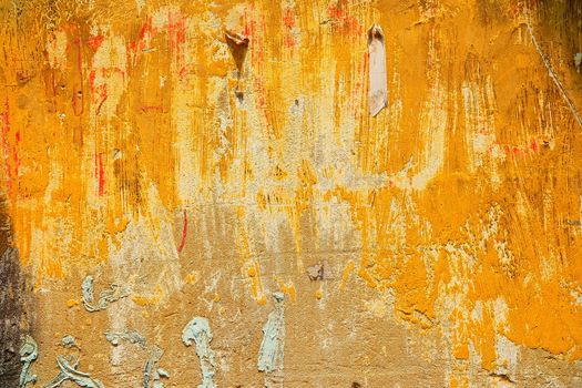 Old Grunge and Yellow Painted Concrete Wall Background.