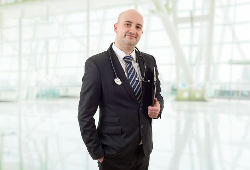 happy male doctor at the hospital