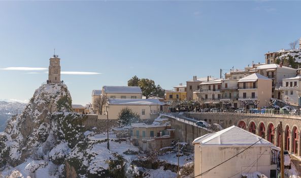 ARAHOVA, GREECE - JANUARY 6, 2019: Arahova village, beautiful winter destination, covered with snow in a sunny day 
